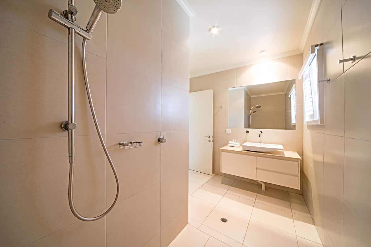 three bedroom ocean view penthouse | bathroom | rainfall showerhead, free toiletries, hair dryer, towels