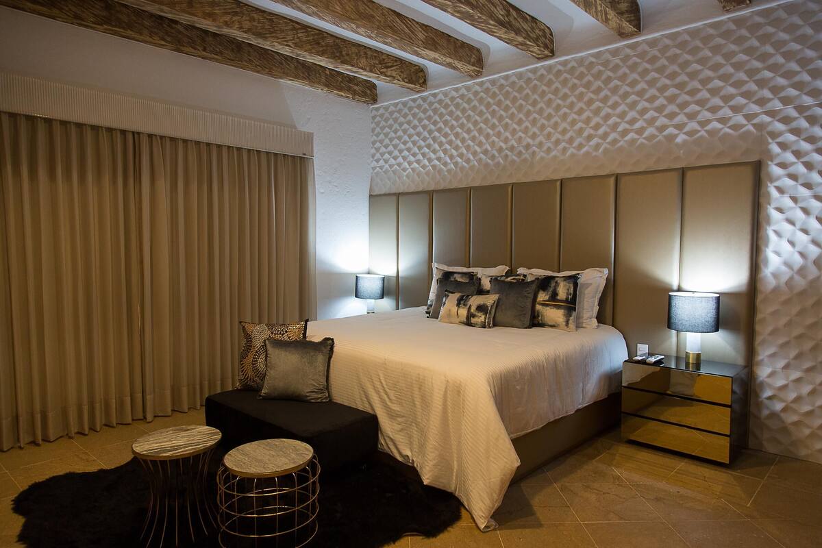Ropa de cama de alta calidad y minibar 