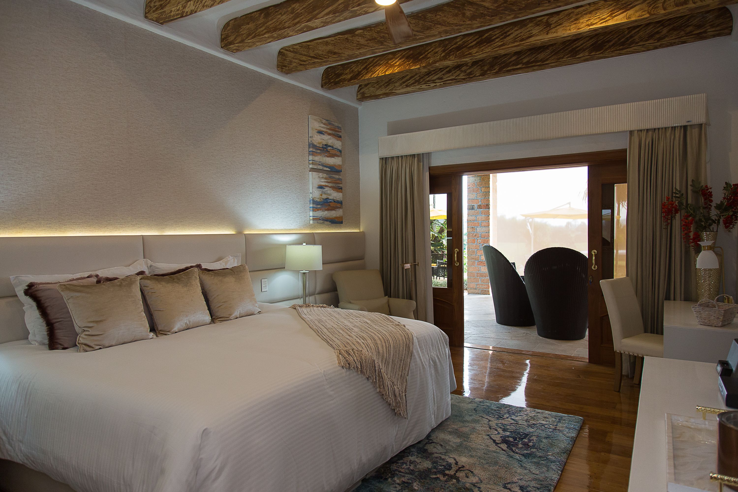 junior suite, lake view | premium bedding, minibar, in-room safe, desk