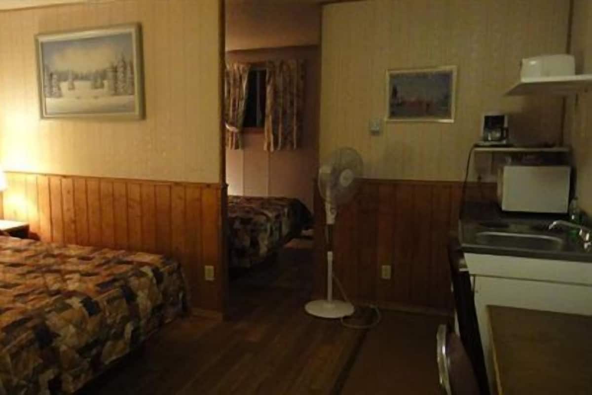 Standard Room, 2 Queen Beds | Cribs (free), WiFi (free)