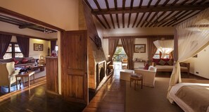 Suite | Living area | Fireplace - Neptune Ngorongoro Luxury Lodge (Karatu)
