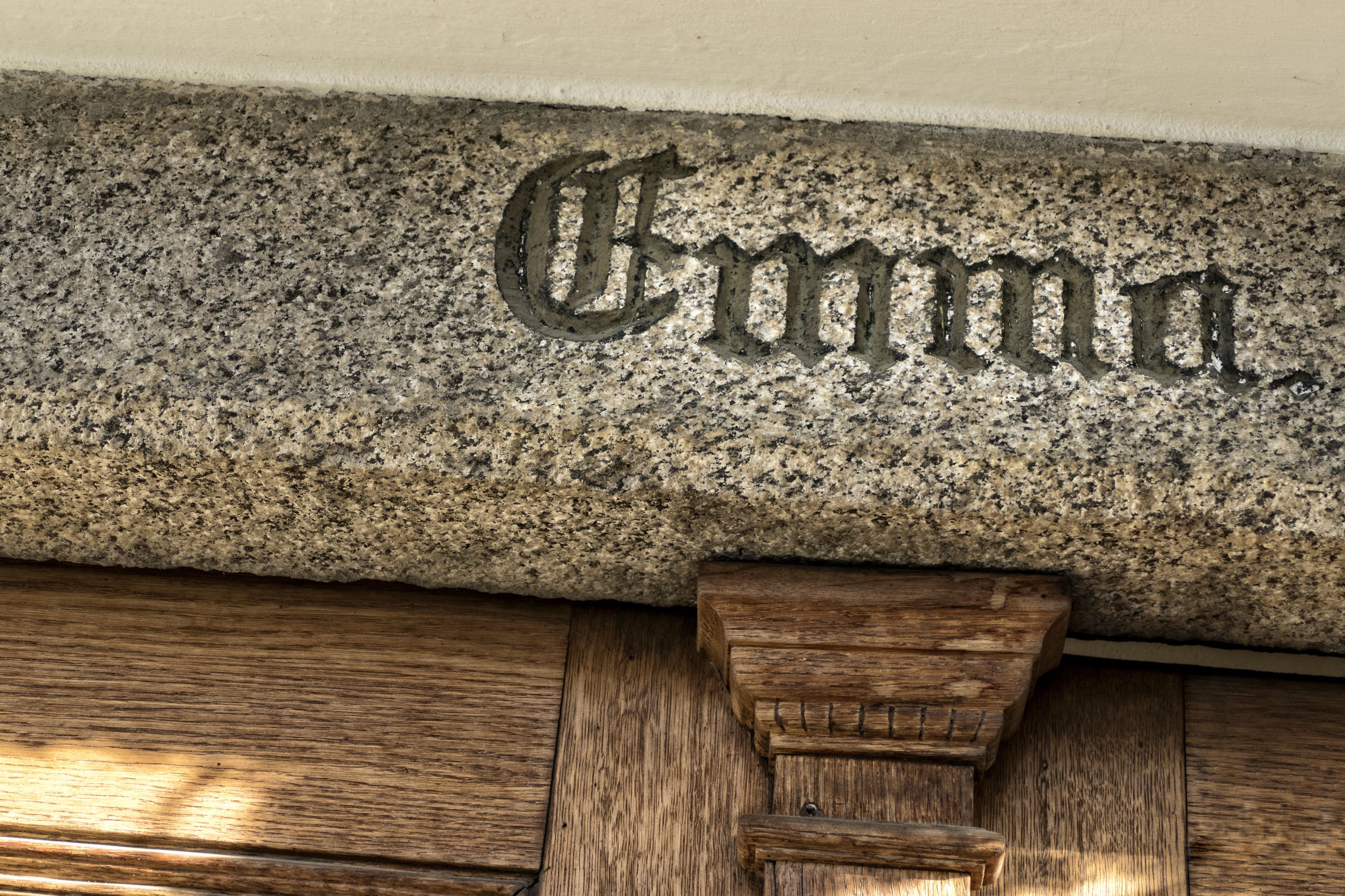 A stone plaque with the name "Emma" engraved on it.