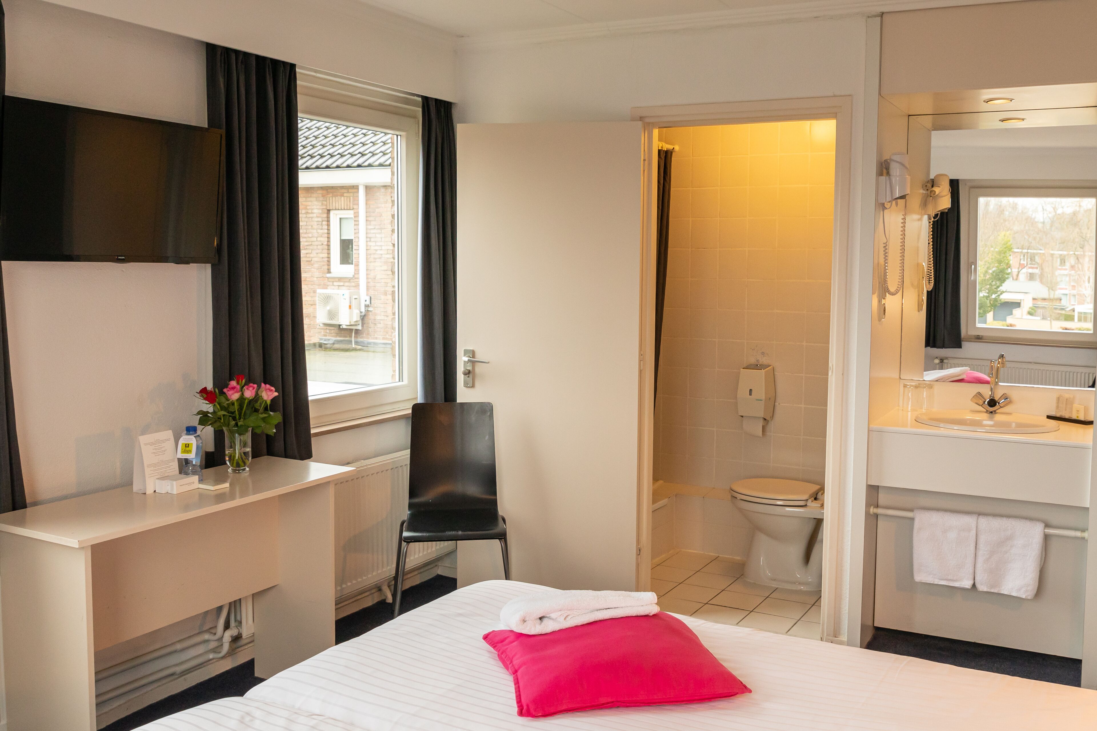 standard double room | in-room safe, desk, laptop workspace, blackout curtains