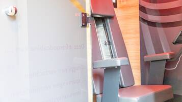Experience comfort in our train carriage with ergonomic seats and a warm, cabin-like atmosphere.