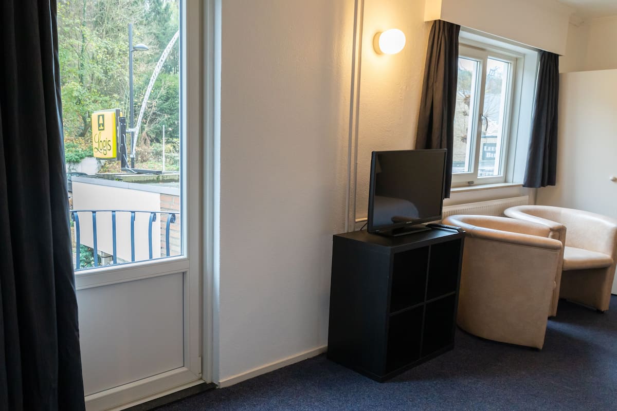 standard double room | in-room safe, desk, laptop workspace, blackout curtains