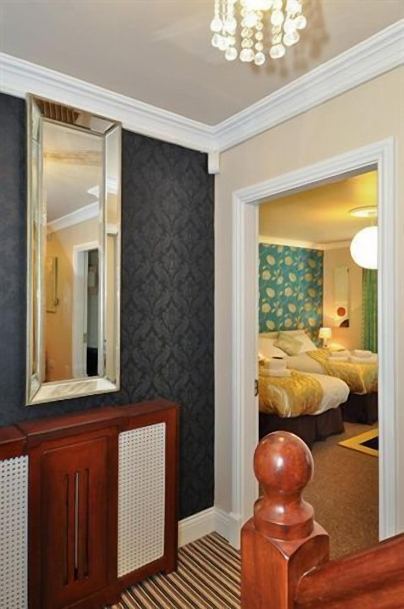 Premium bedding, desk, iron/ironing board, rollaway beds