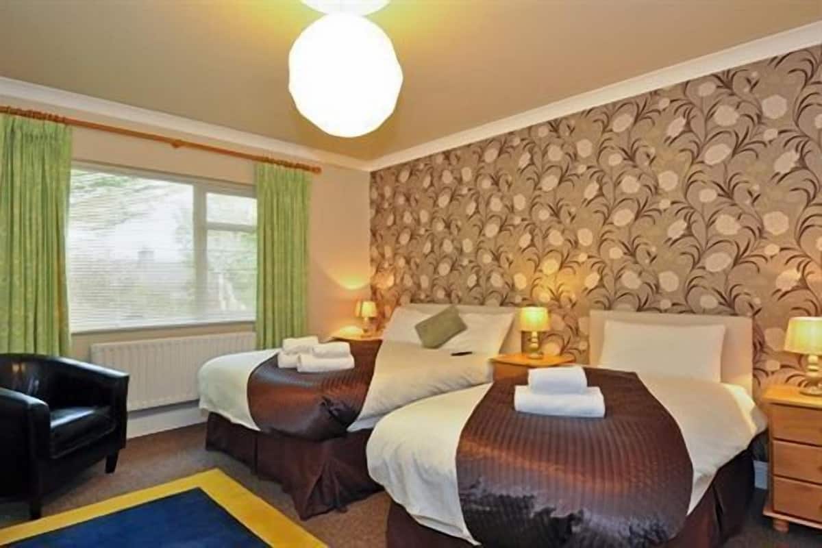 Premium bedding, desk, iron/ironing board, rollaway beds