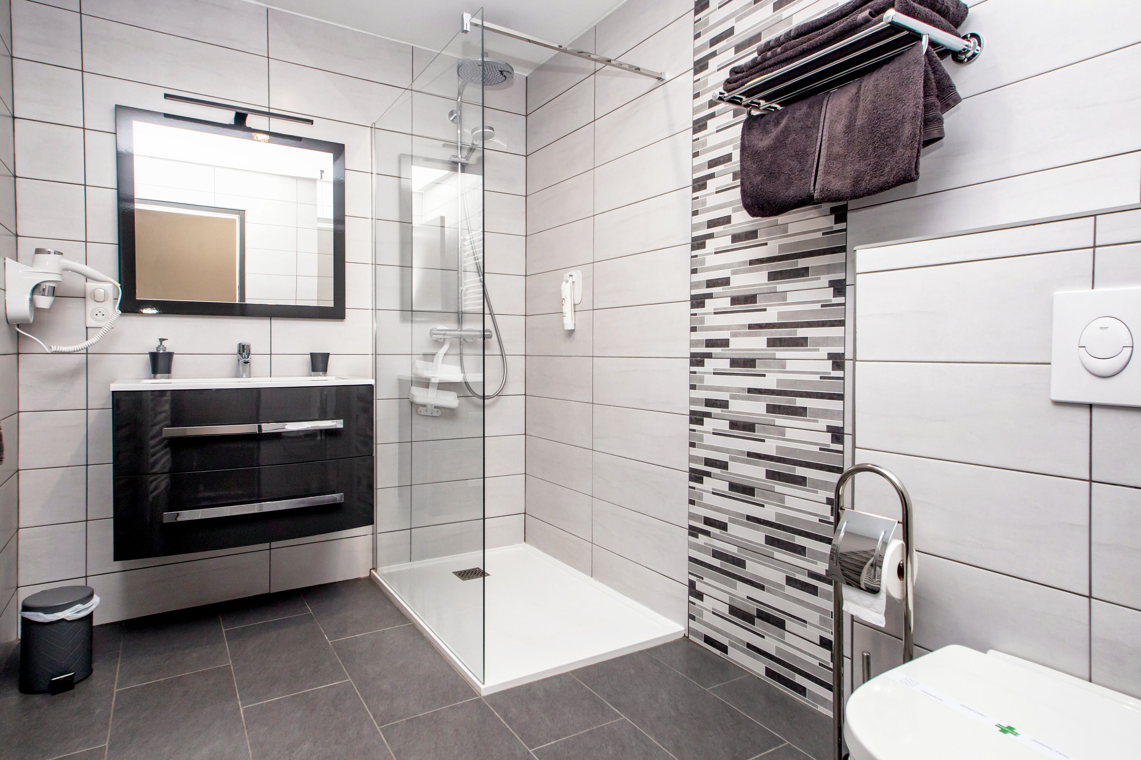 superior double room | bathroom | hair dryer, towels
