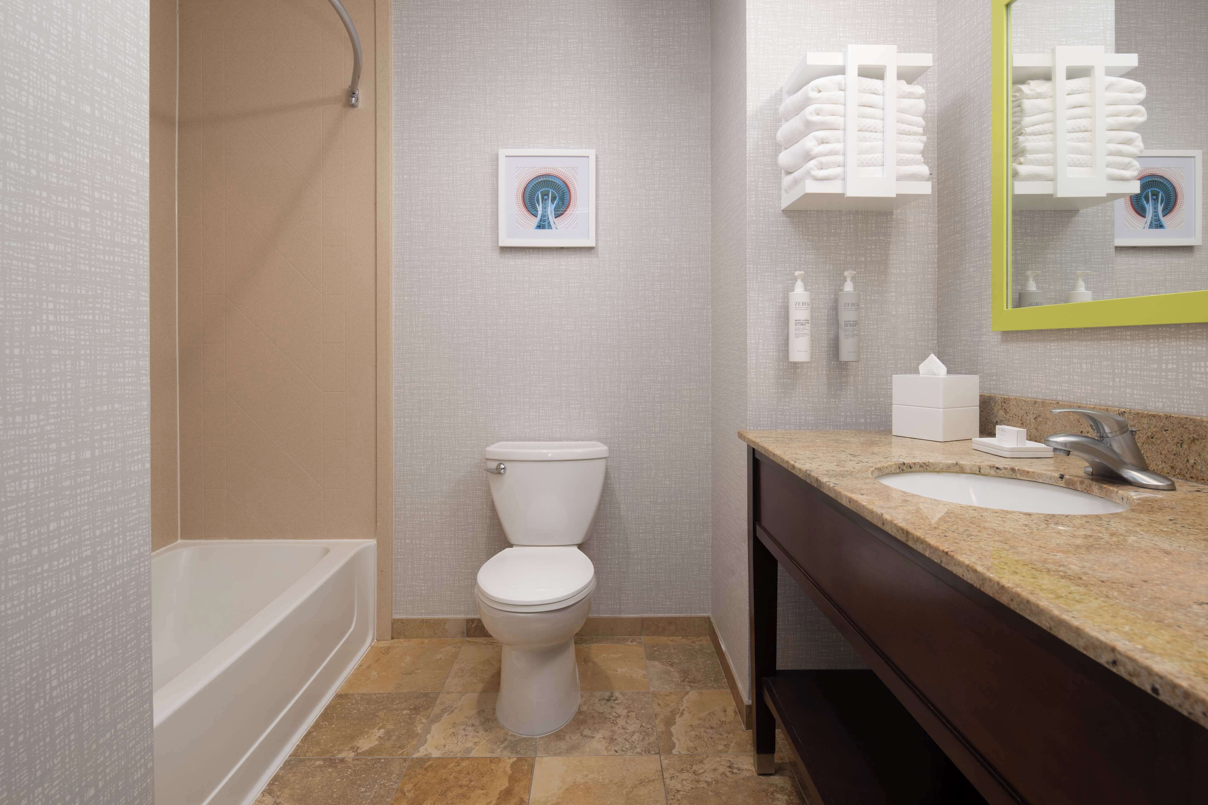 two queen beds, non-smoking | bathroom | hydromassage showerhead, free toiletries, hair dryer, towels