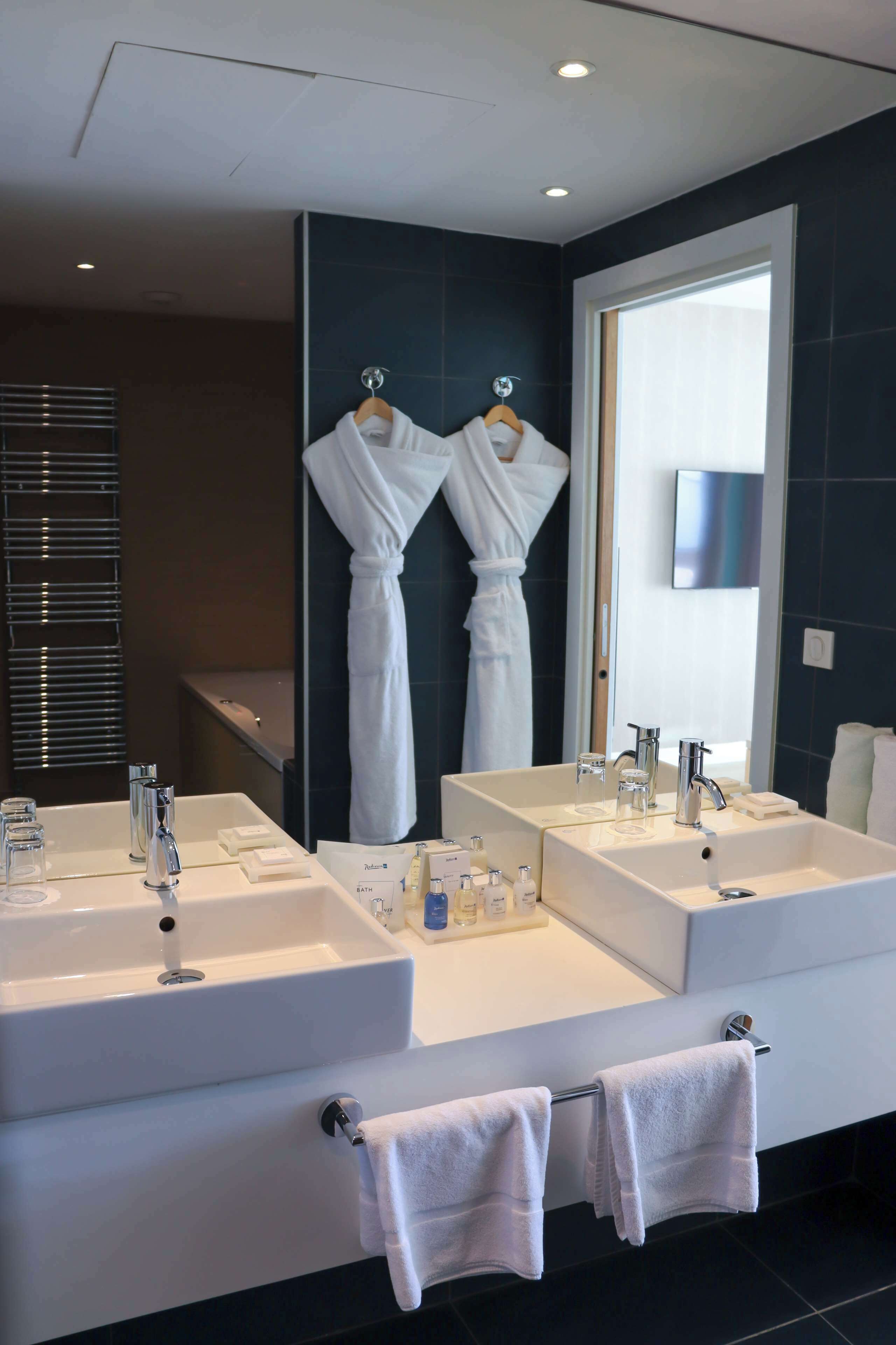 shower, designer toiletries, hair dryer, bathrobes