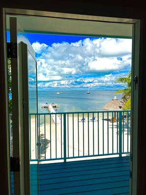 Chambre Deluxe, 1 très grand lit | Vue sur la plage ou l’océan