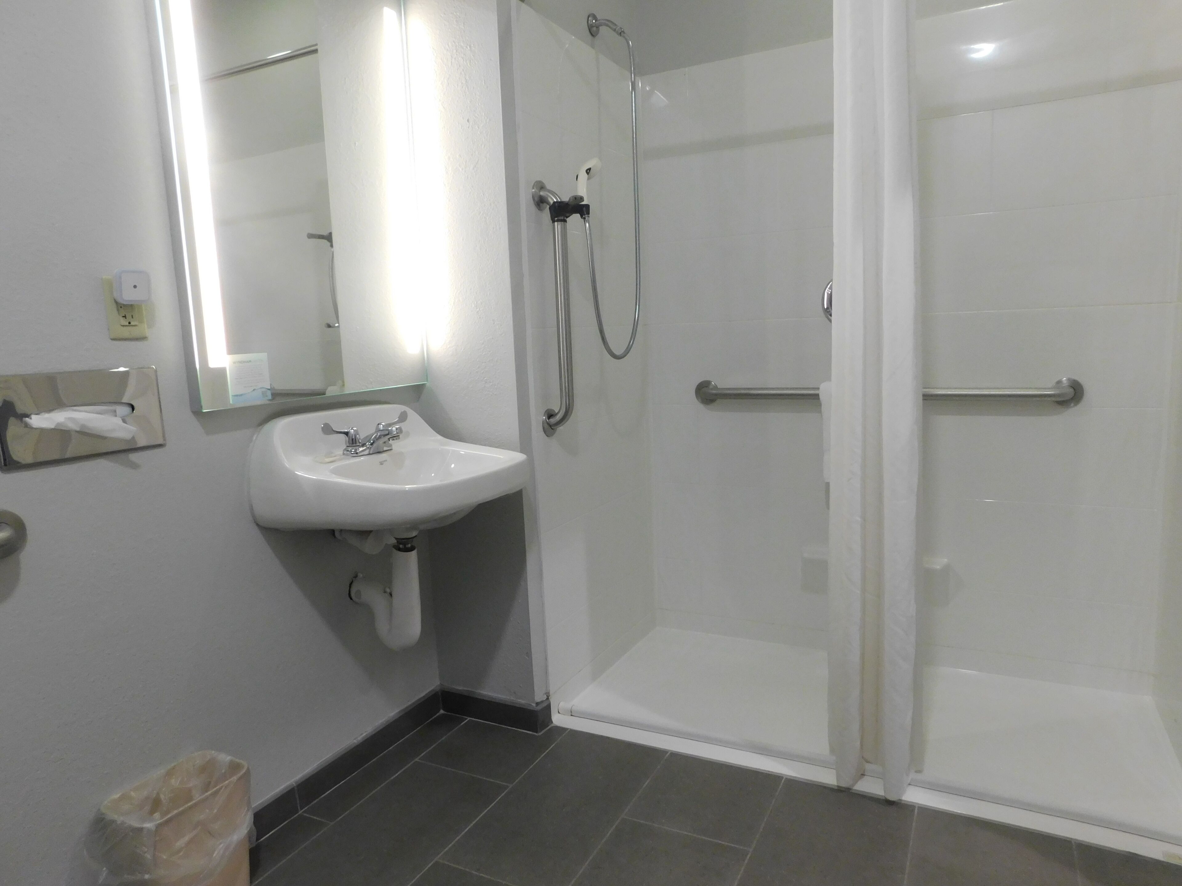 suite, 1 queen bed, accessible, non smoking (roll-in shower) | bathroom | hair dryer, towels