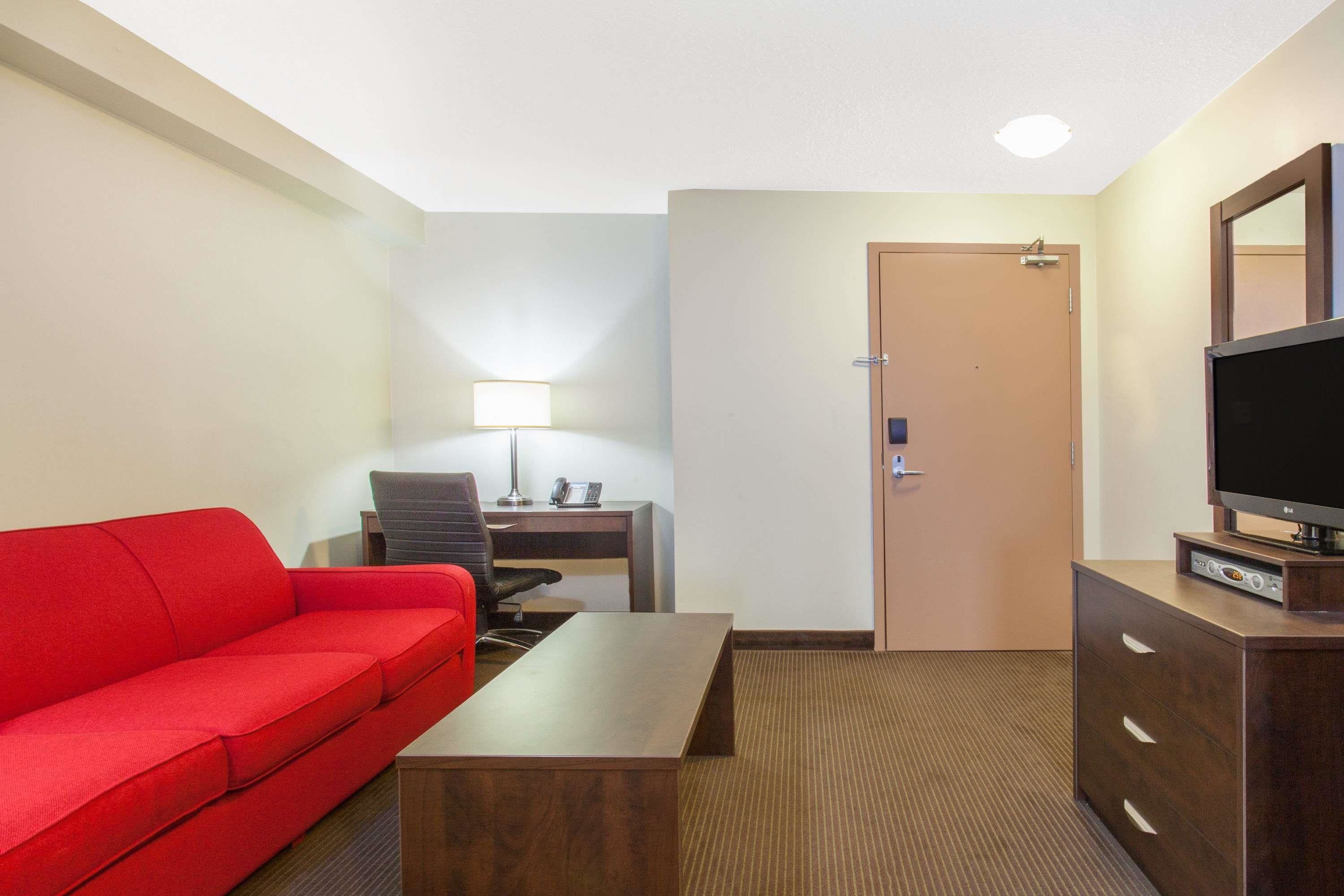 premium bedding, desk, laptop workspace, iron/ironing board