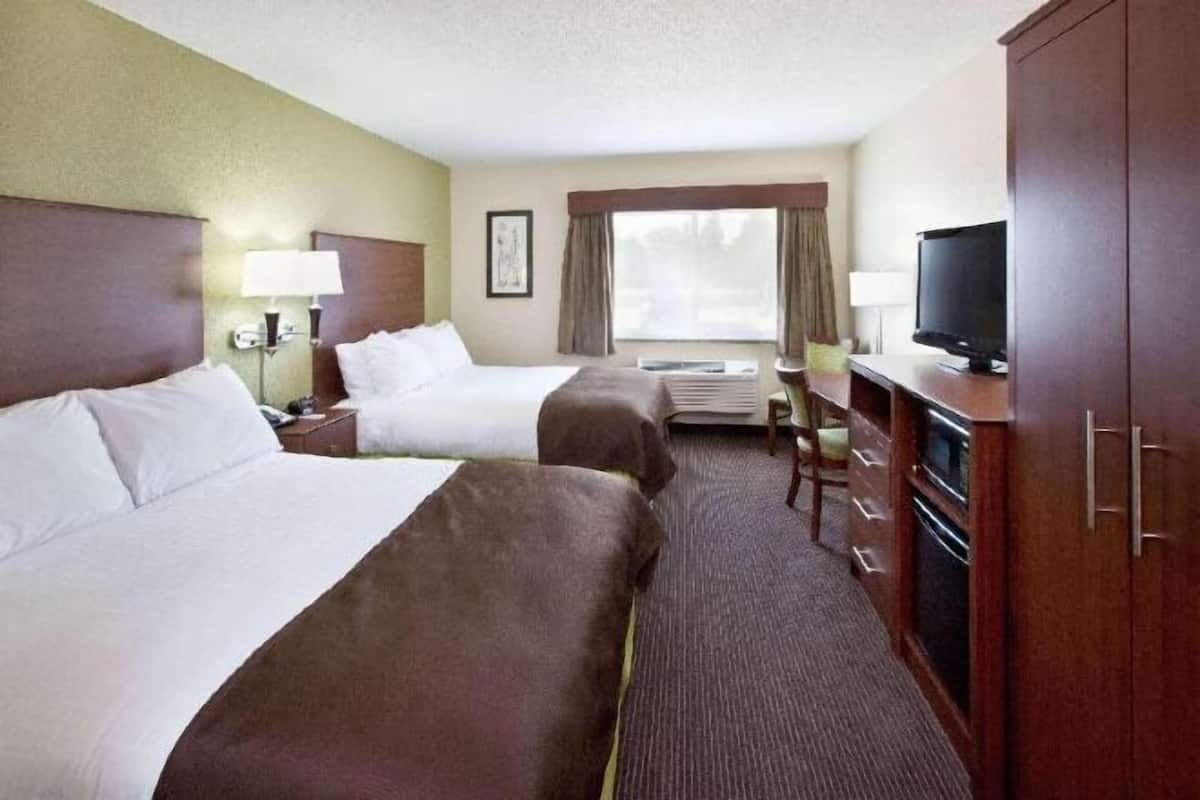 Desk, laptop workspace, blackout curtains, iron/ironing board