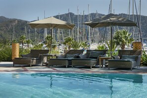 Outdoor pool, pool umbrellas, pool loungers