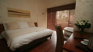 Premium bedding, pillow-top beds, minibar, in-room safe