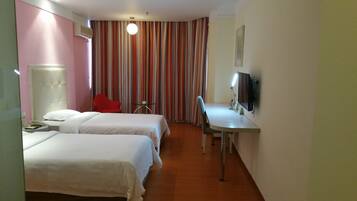 Deluxe Room, 1 King Bed | Memory-foam beds, minibar, individually decorated, desk