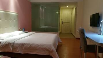 Deluxe Room, 1 King Bed | Memory-foam beds, minibar, individually decorated, desk