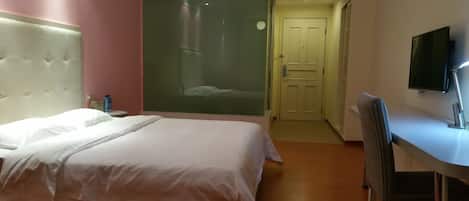 Deluxe Room, 1 King Bed | Memory foam beds, minibar, individually decorated, desk