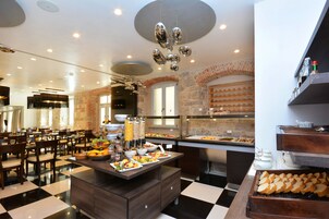Daily buffet breakfast (EUR 25 per person)