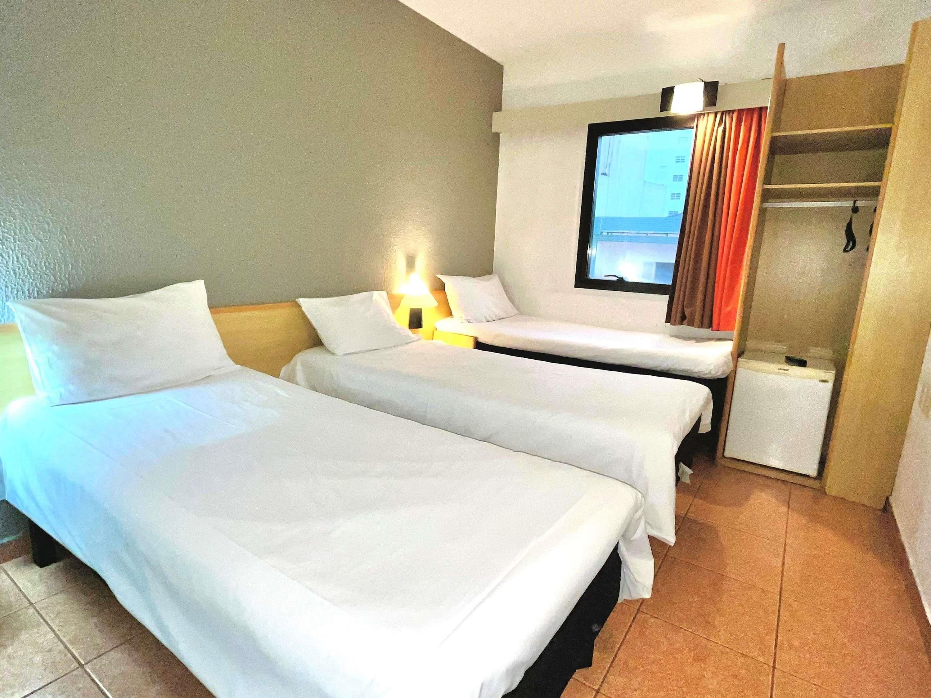 Standard Twin Room, 3 Twin Beds | Minibar, blackout drapes, WiFi (free), bed sheets