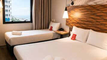 Frigobar, cortinas blackout, Wi-Fi de cortesia, roupa de cama