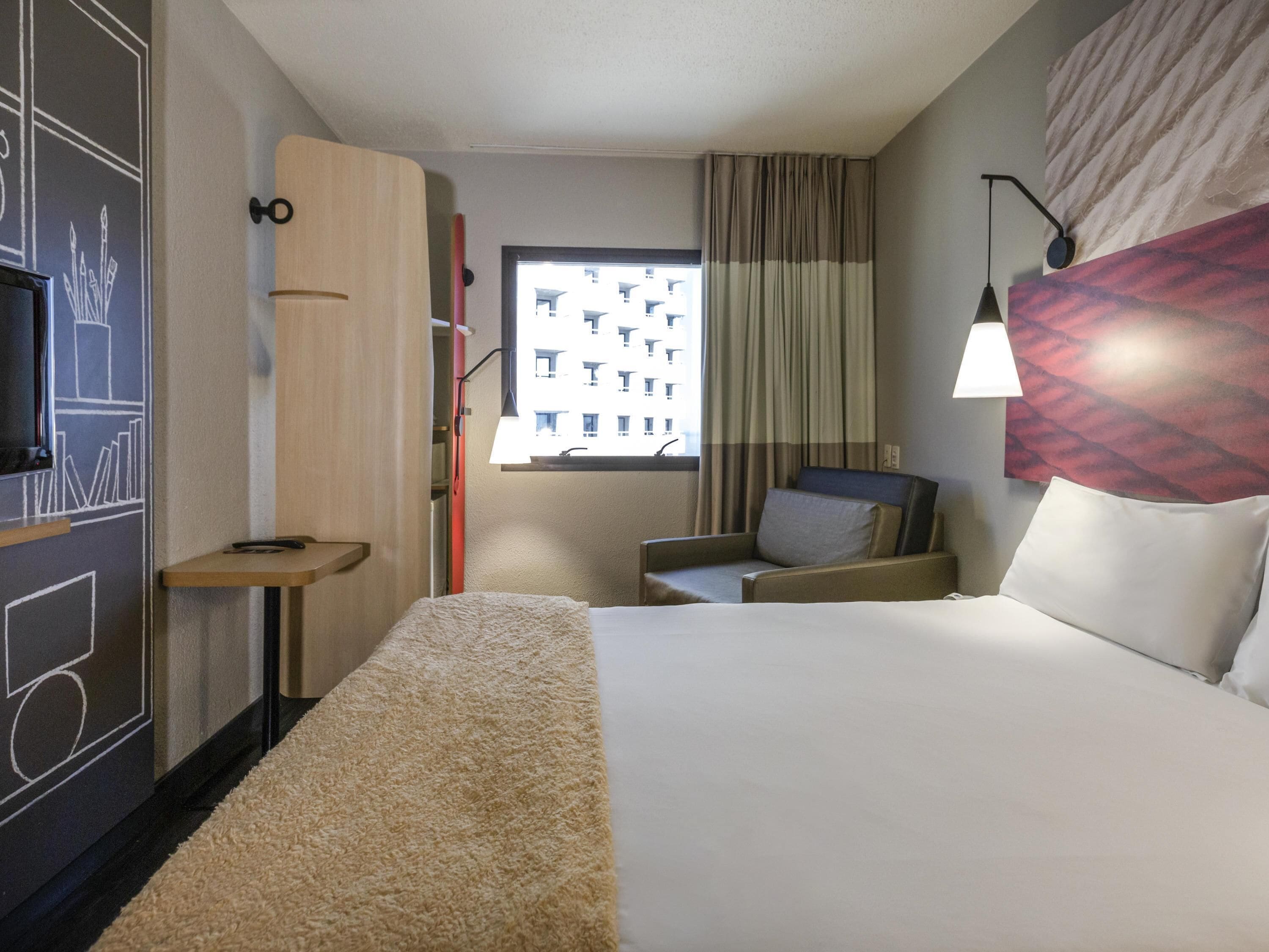 Frigobar, cortinas blackout, Wi-Fi de cortesia, roupa de cama