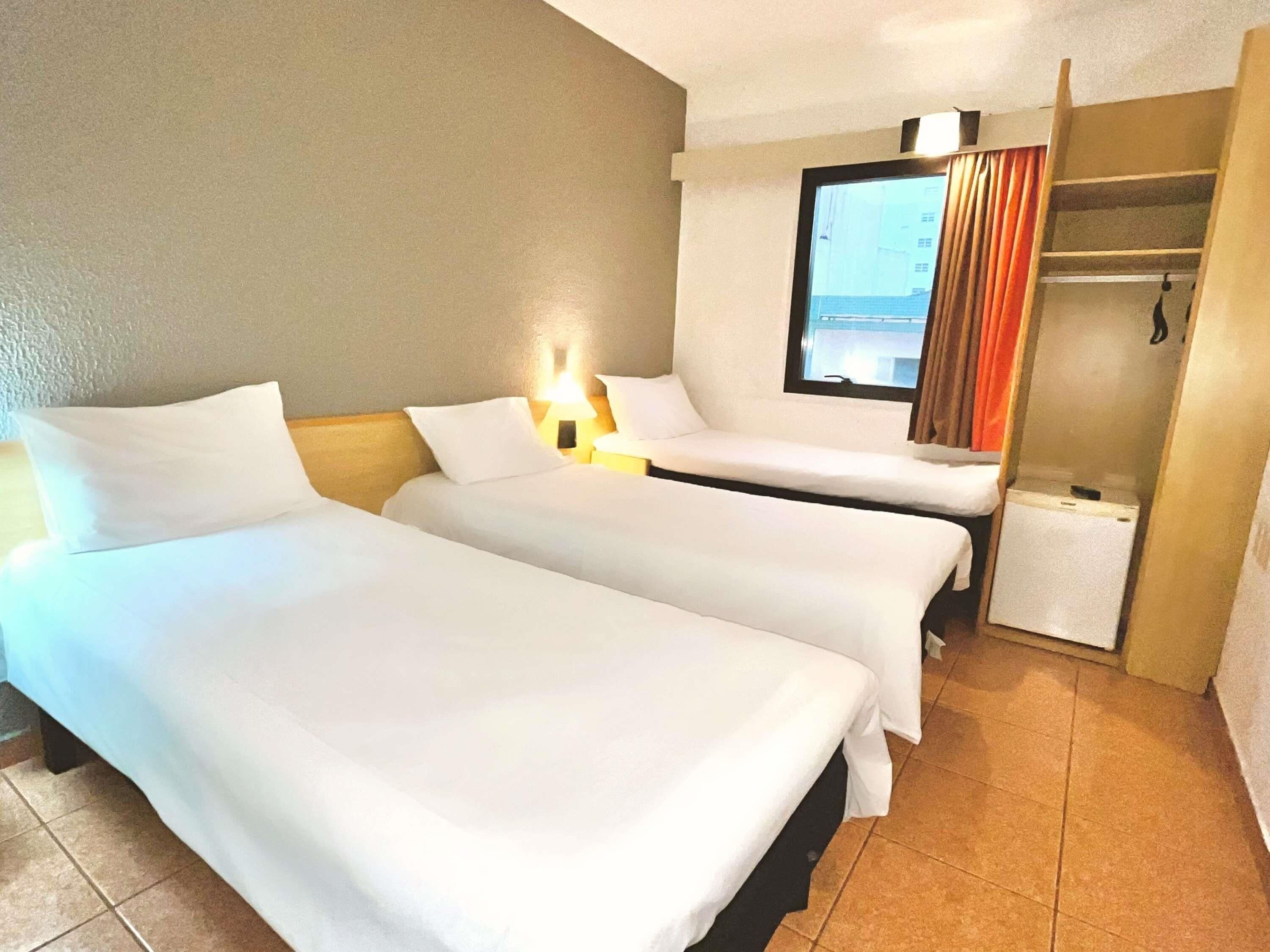 Standard Twin Room, 3 Single Beds | Minibar, blackout curtains, free WiFi, bed sheets