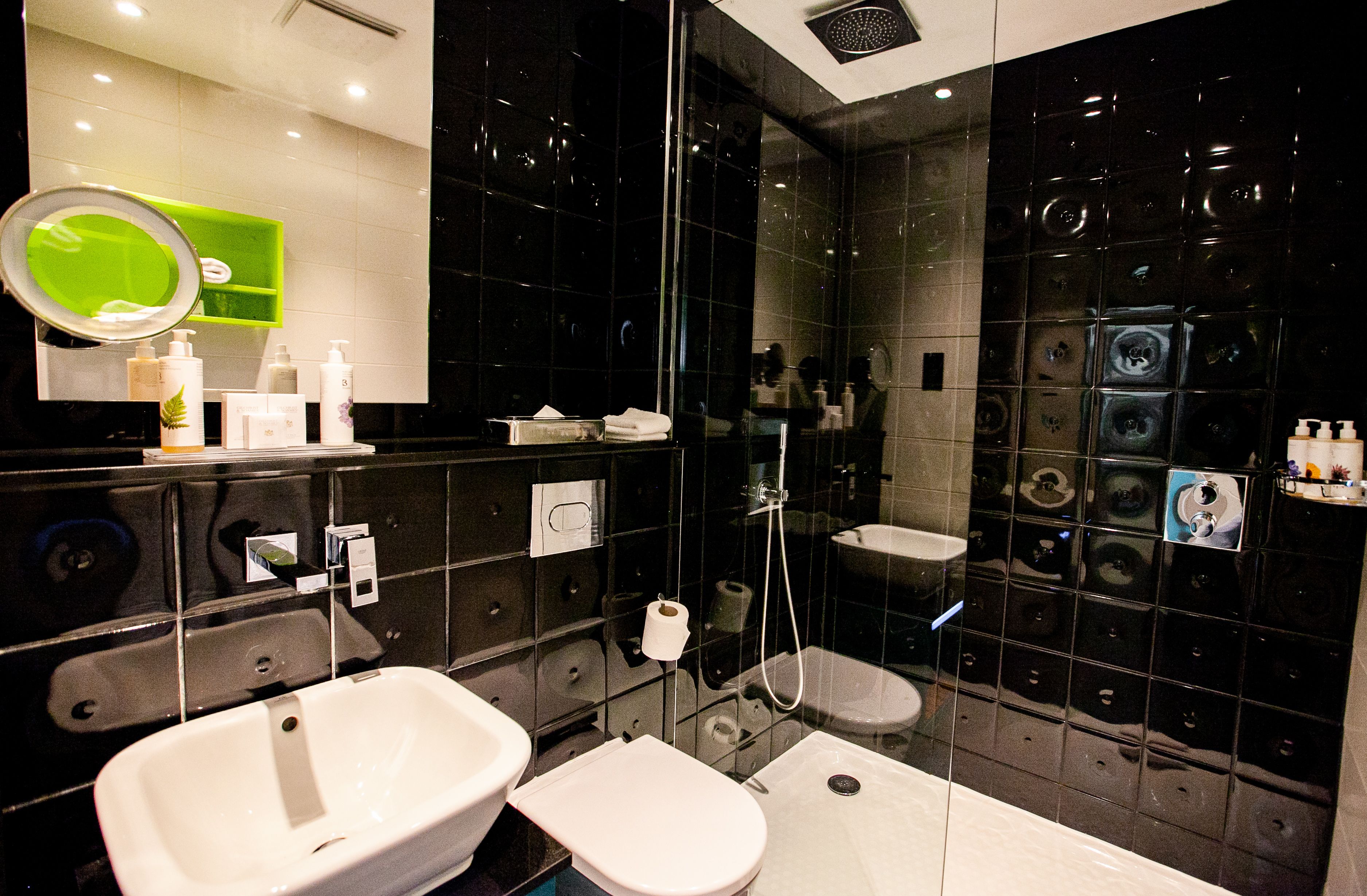 premium room, 2 queen beds | bathroom | shower, free toiletries, hair dryer, bathrobes