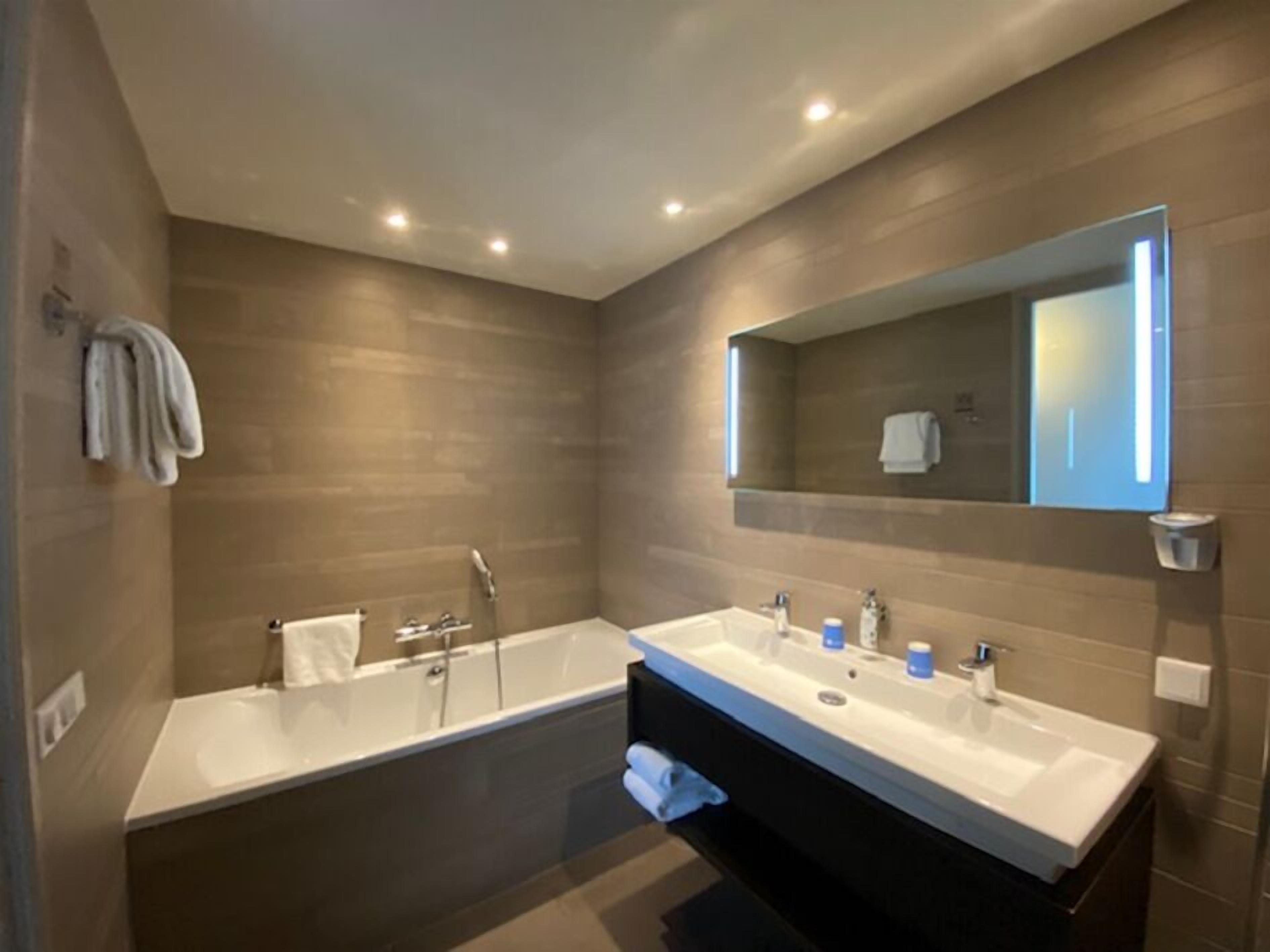 junior room | bathroom | separate bathtub and shower, rainfall showerhead
