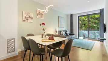 Standard Apartment, 2 Bedrooms | Living area | 32-inch flat-screen TV with satellite channels, LCD TV, DVD player