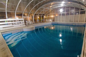 Indoor pool, seasonal outdoor pool, pool umbrellas, sun loungers