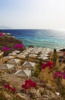 Ubicación a pie de playa, cabañas de uso gratuito, tumbonas y sombrillas