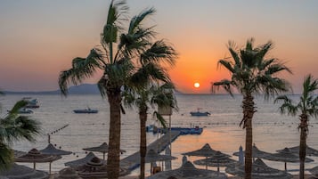 On the beach, free beach cabanas, sun loungers, beach umbrellas