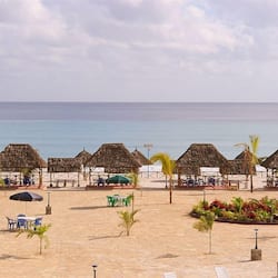 On the beach, free beach cabanas, beach towels, beach volleyball