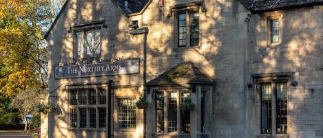 A stone building with a sign reading "The Northley Arms."