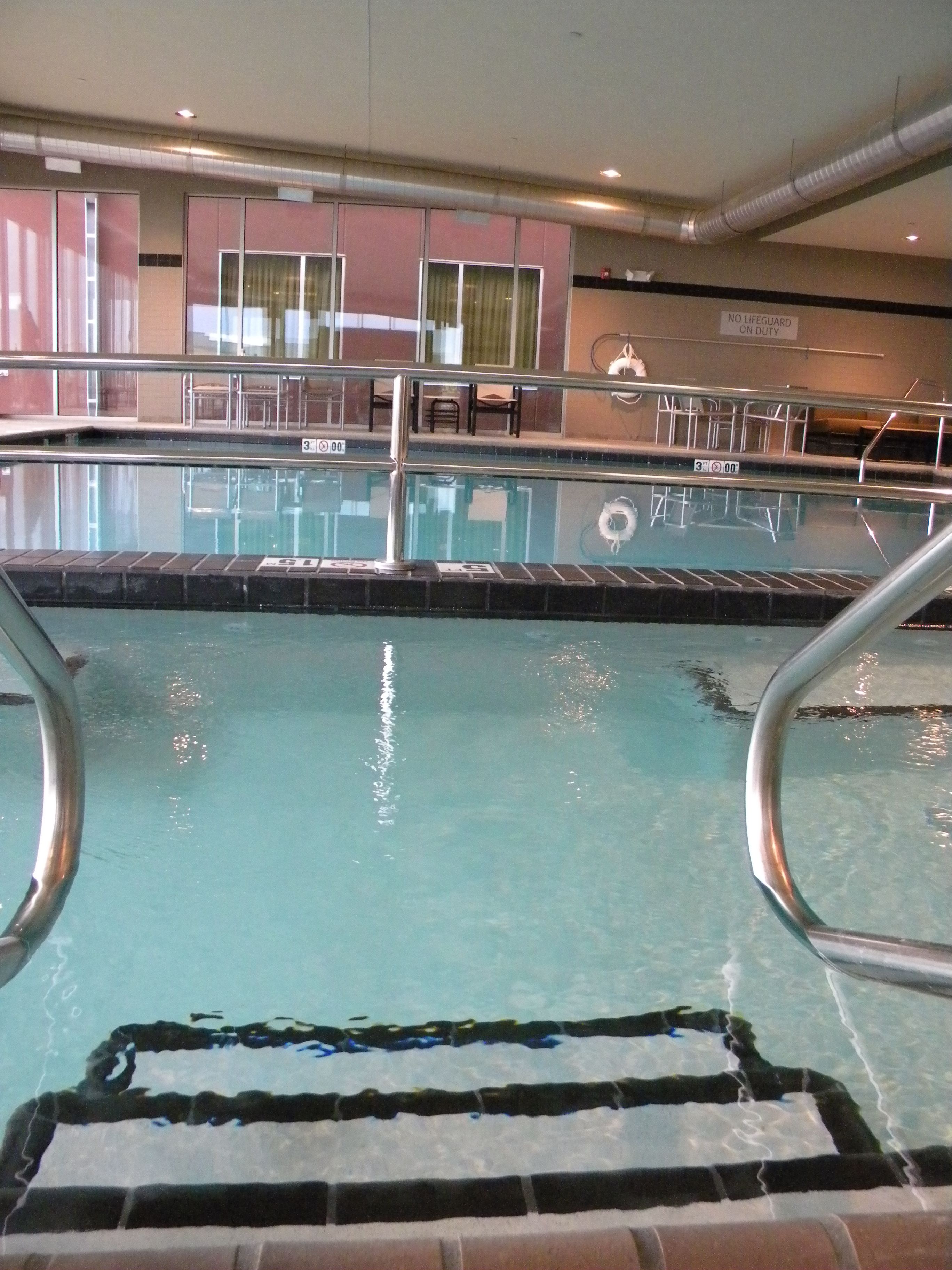 indoor pool, open 7:00 am to 10:00 pm, pool loungers