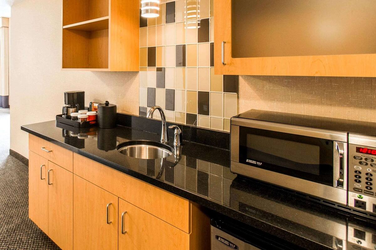 pillow-top beds, desk, laptop workspace, iron/ironing board