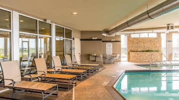 Indoor pool, open 7:00 AM to 10:00 PM, pool loungers