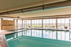Indoor pool, open 7:00 AM to 10:00 PM, sun loungers