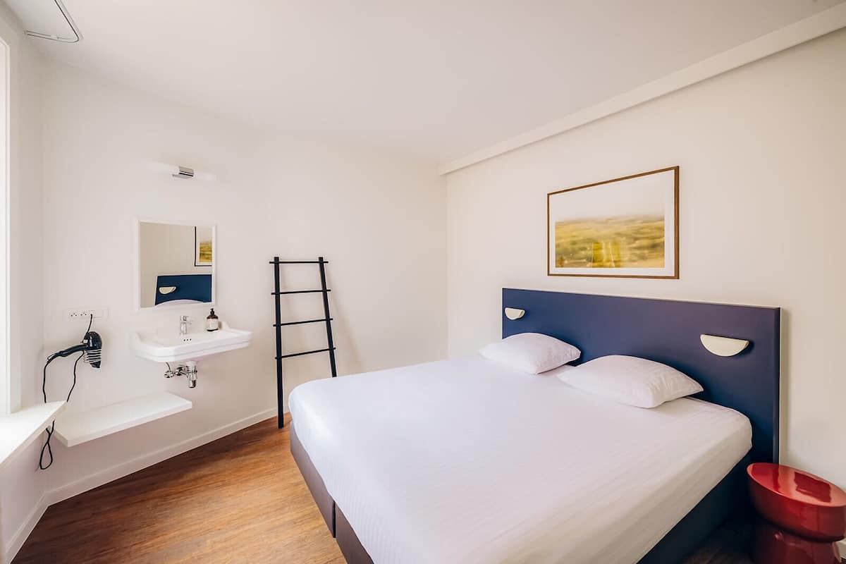 Familie suite | Een kluis op de kamer, verduisterende gordijnen, gratis wifi