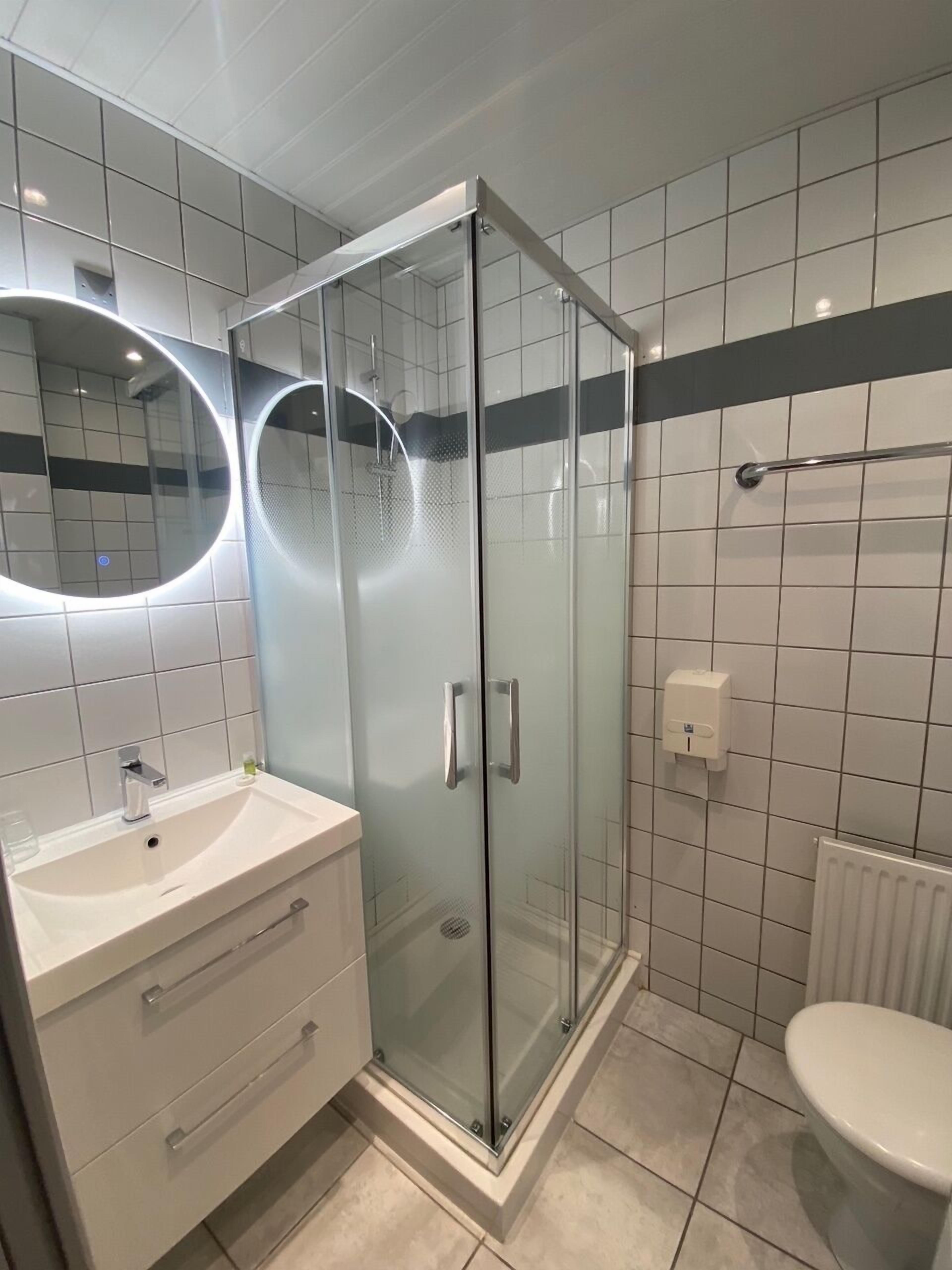 comfort double room (large) | bathroom | free toiletries, hair dryer, towels