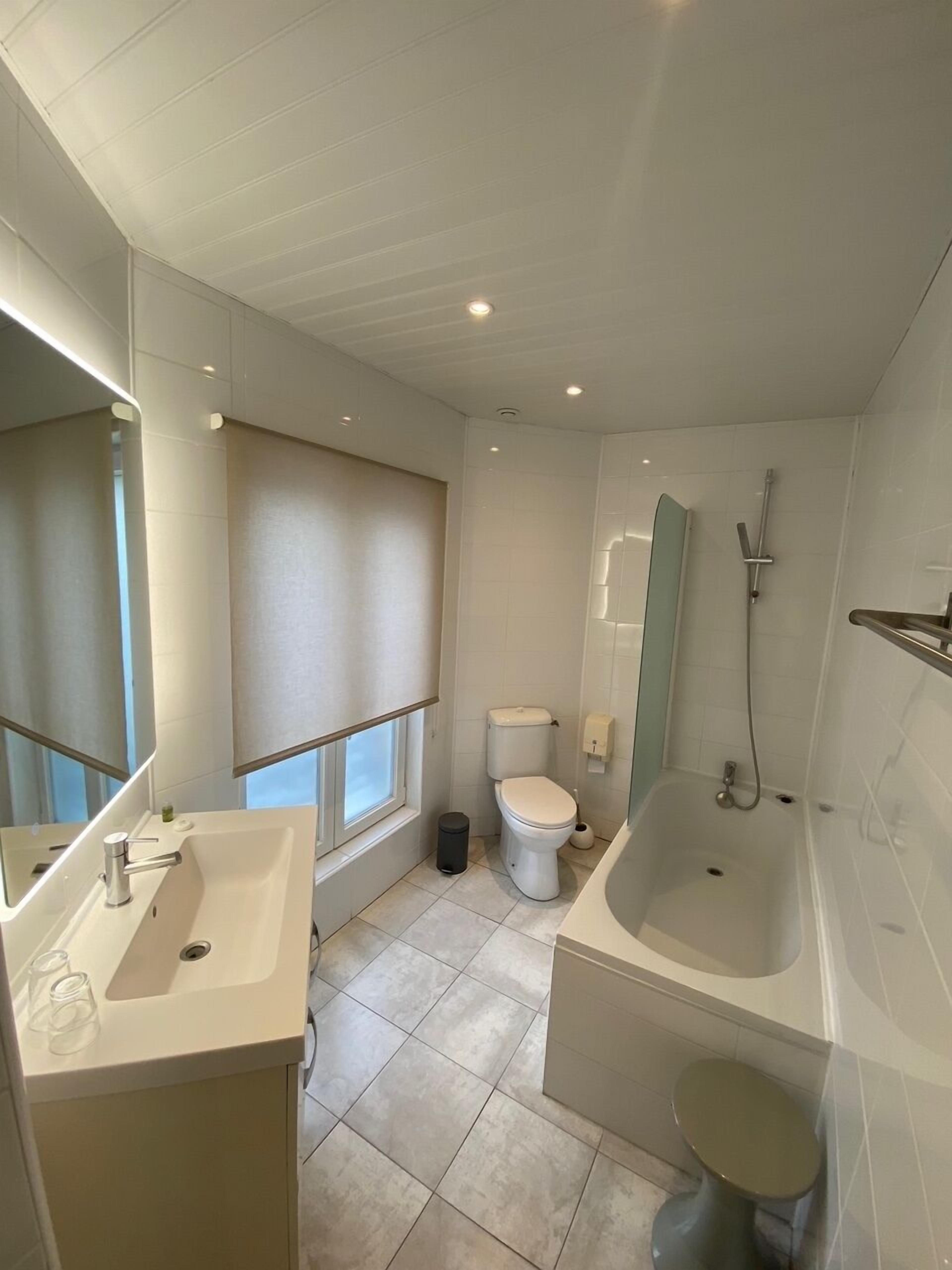 comfort double room (large) | bathroom | free toiletries, hair dryer, towels
