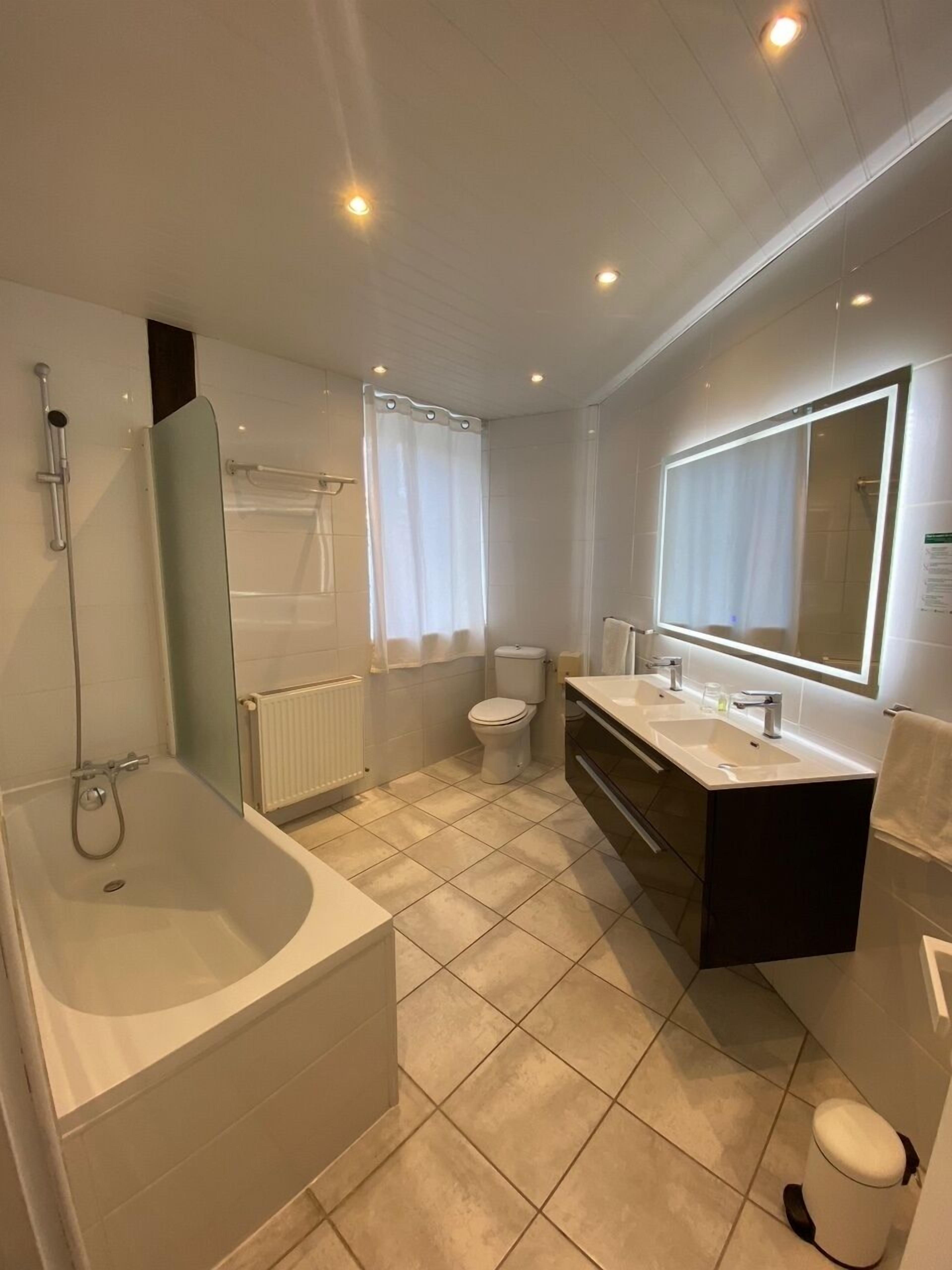 comfort double room (large) | bathroom | free toiletries, hair dryer, towels