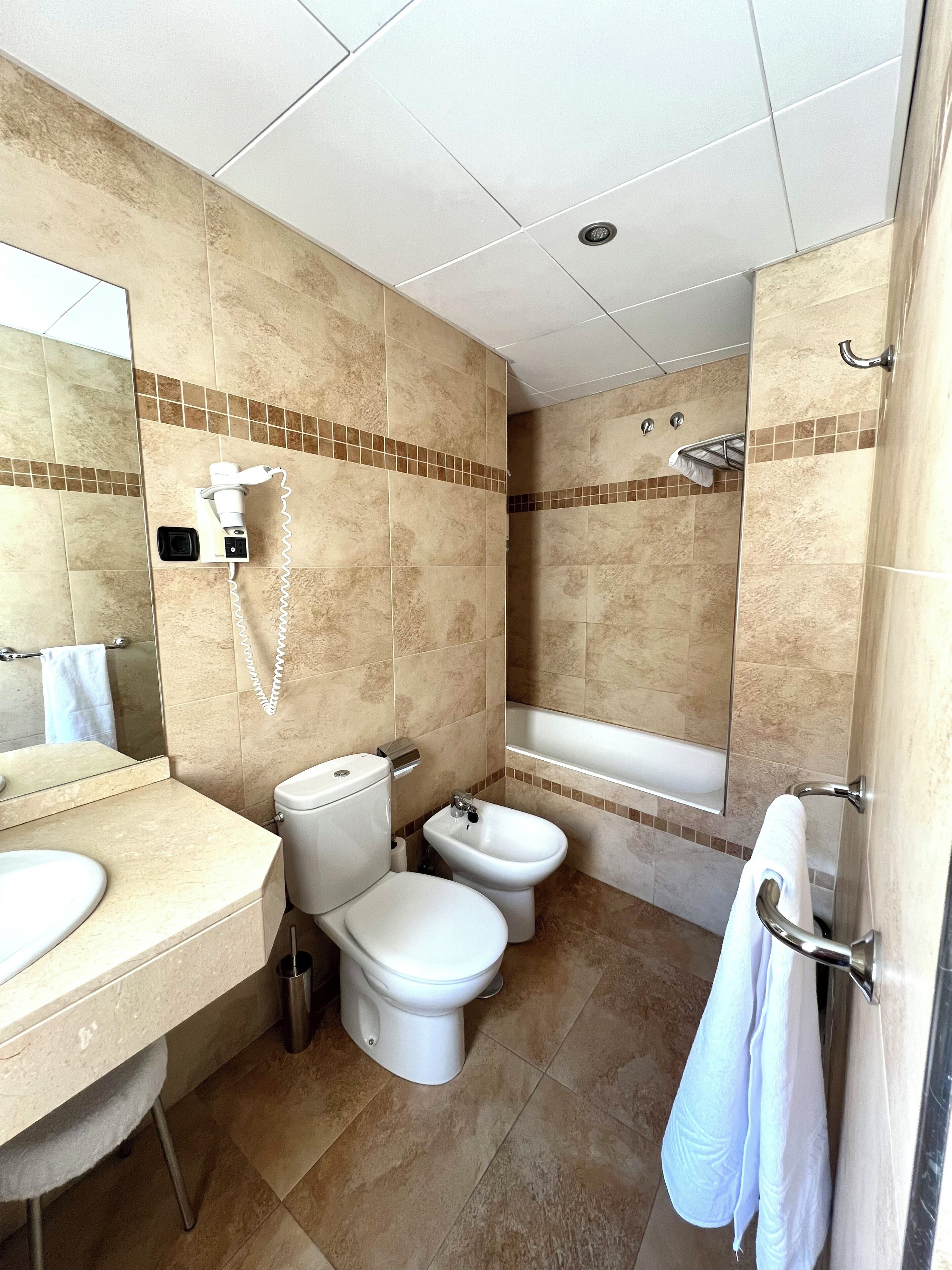 free toiletries, hair dryer, towels, soap