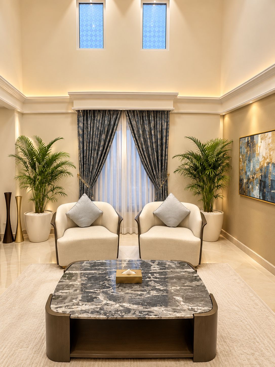 A spacious living room with a large coffee table, two sofas, and potted plants.