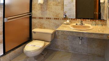 Rainfall showerhead, free toiletries, hair dryer, towels