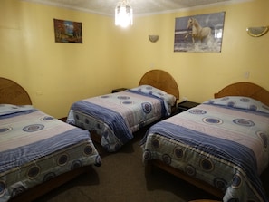 Triple Room | Down duvets, in-room safe, individually decorated