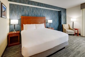 Desk, laptop workspace, blackout curtains, iron/ironing board