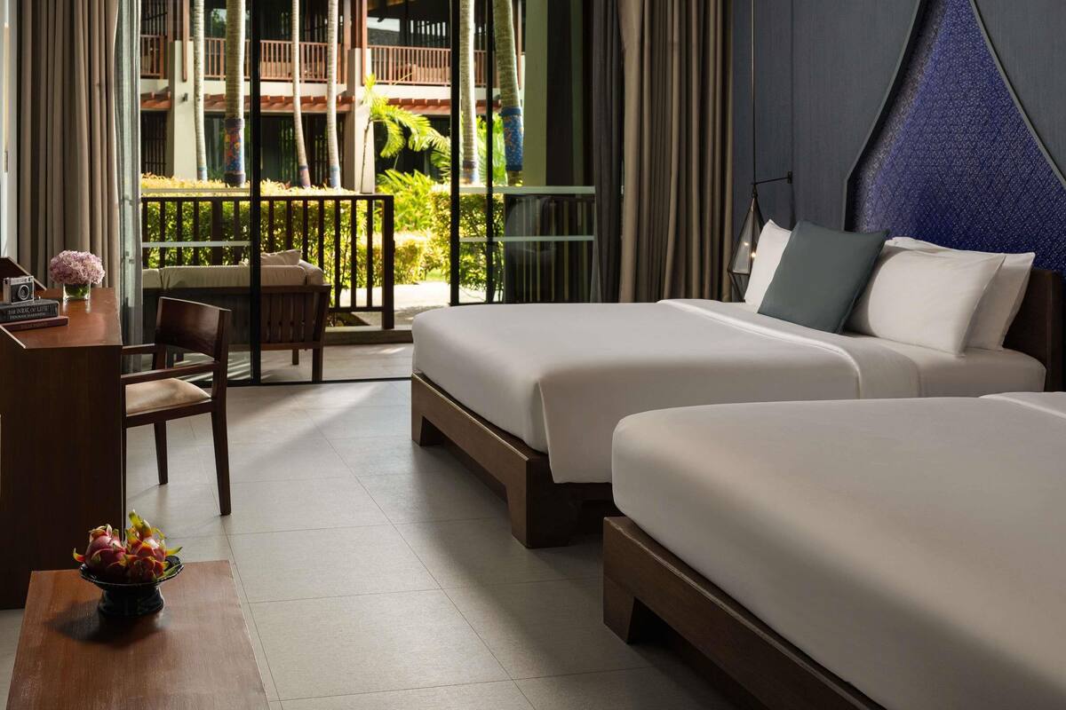 Deluxe Family Room, 1 King Bed & 1 Queen Bed | Premium bedding, down duvets, minibar, in-room safe